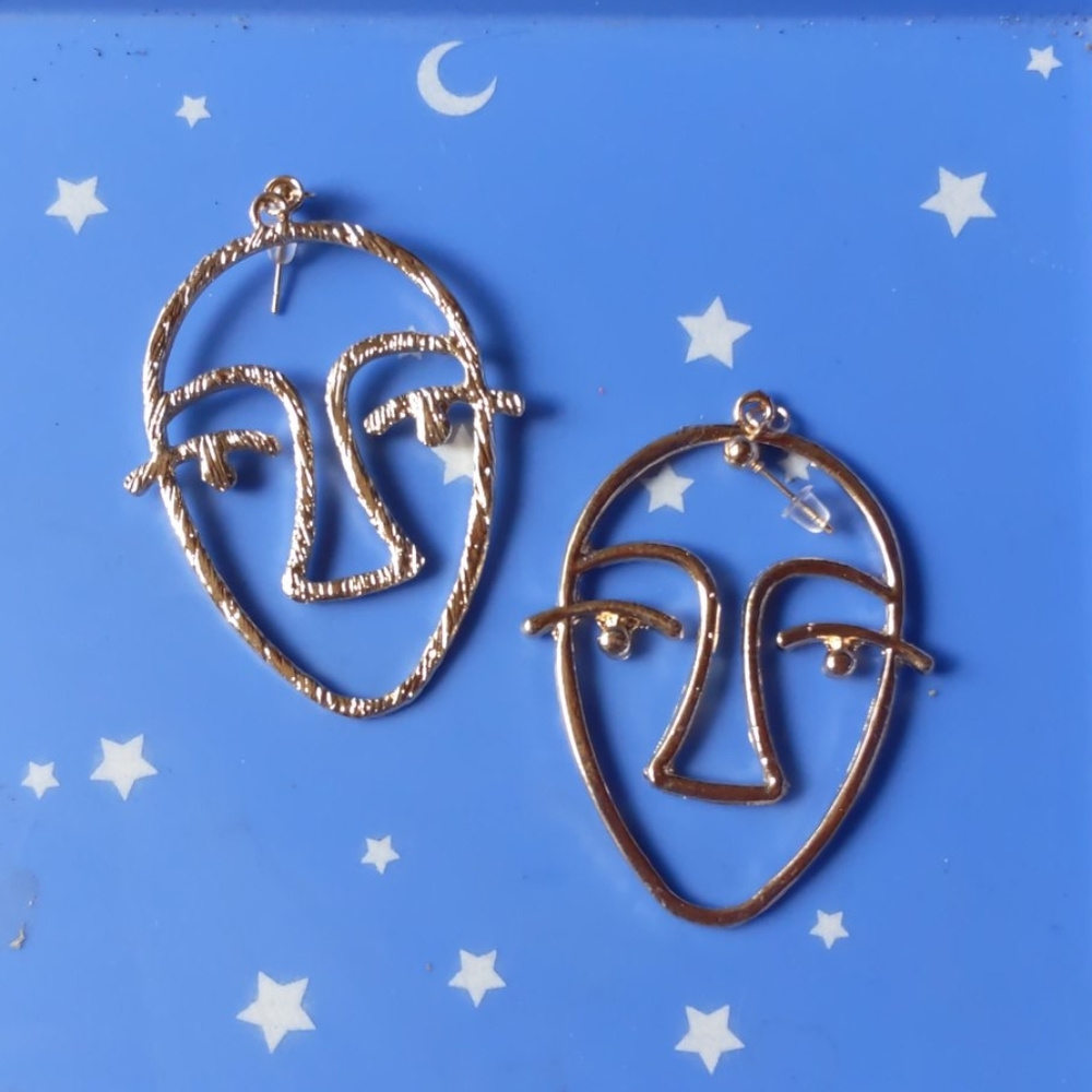 Abstract face earrings